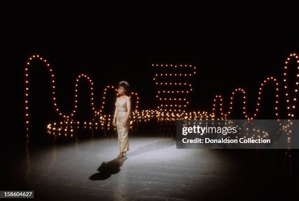 Pop and country singer Brenda Lee performs on the NBC TV music show 'Hullabaloo' in May 1965 in New York City, New York.