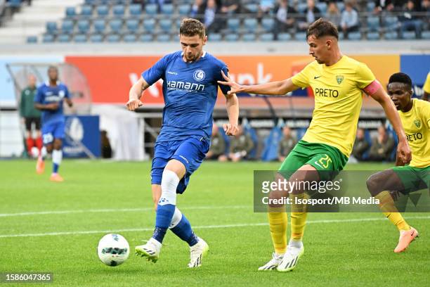 Hugo Cuypers of AA Gent battles for the ball with Tomas Nemcik of MSK Zilina during the UEFA Europa Conference League season 2023 - 2024, second...