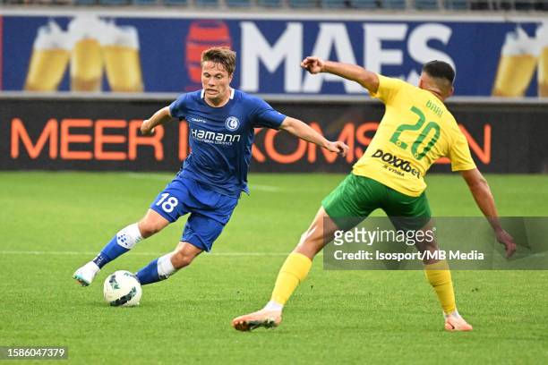 Matisse Samoise of AA Gent battles for the ball with Krisztian Bari of MSK Zilina during the UEFA Europa Conference League season 2023 - 2024, second...