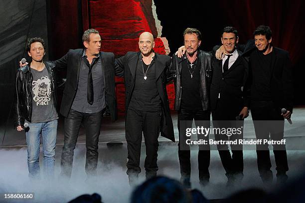 Singers Raphael, Garou, Pascal Obispo, Johnny Hallyday, Marc Lavoine and Patrick Bruel perform during 'La Chanson De L'Annee 2012' Show Recording at...