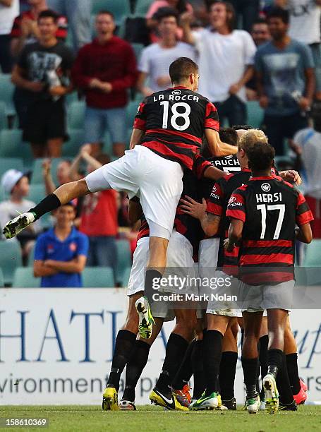 The Wanderers celebrate a goal by Dino Kresinger during the round 12 A-League match between the Western Sydney Wanderers and Adelaide United at...