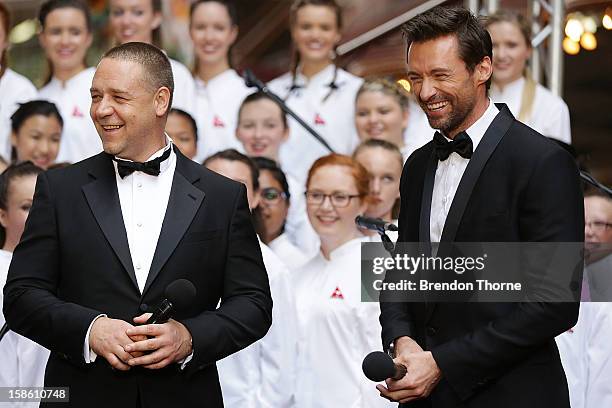 Hugh Jackman and Russell Crowe share a joke on the red carpet during the Australian premiere of 'Les Miserables' at the State Theatre on December 21,...