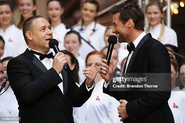 Hugh Jackman and Russell Crowe share a joke on the red carpet during the Australian premiere of 'Les Miserables' at the State Theatre on December 21,...