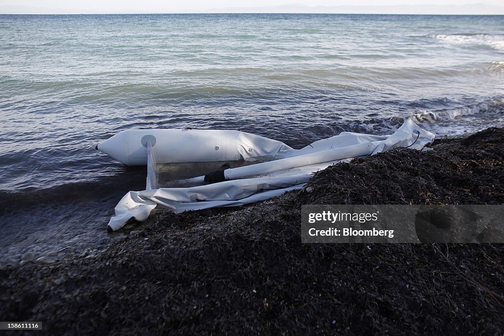 Deflated Rib Boat A deflated inflatable boat used by immigrants the previous night to ...