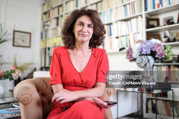 French television producer Fabienne Servan-Schreiber poses for a portrait at her home on October 19, 2012 in Paris,France.