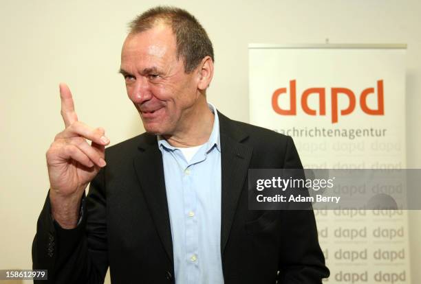 Ulrich Ende, dapd news agency investor and former CEO of NTV N24 television, leaves leaves a news conference on December 21, 2012 in Berlin, Germany....