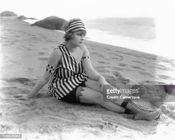 One of Mack Sennet's bathing beauties Claire Anderson posing on the beach. Circa 1920