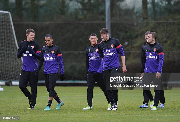 Aaron Ramsey, Theo Walcott, Alex Oxlade-Chamberlain, Carl Jenkinson, Kieran Gibbs and Jack Wilshere of Arsenal during a training session at London...