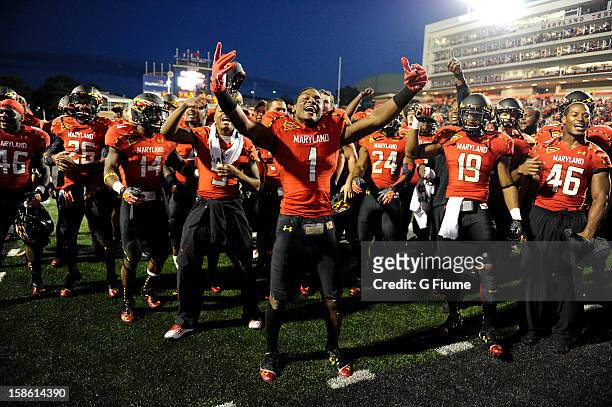 Stefon Diggs of the Maryland Terrapins celebrates with teammates after a victory against the Wake Forest Demon Deacons at Byrd Stadium on October 6,...