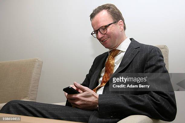 Insolvency lawyer Christian Koehler-Ma arrives for a news conference on December 21, 2012 in Berlin, Germany. The financial newswire Dow Jones is to...