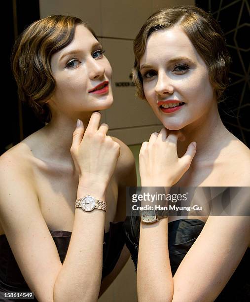 Models pose for media during the Malte tourbillon 100th anniversary celebration of luxury watch brand Vacheron Constantin at Hyundai Department Store...