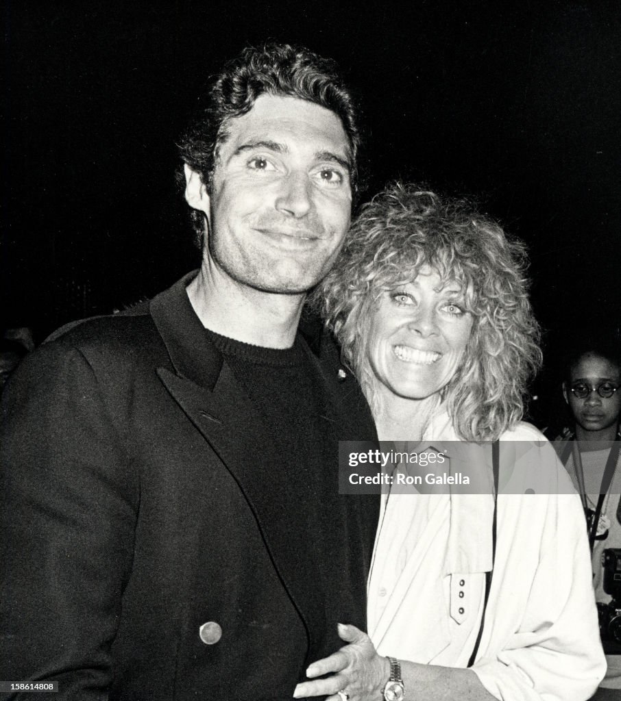Actor Michael Nouri and wife Vicki Light being photographed on May