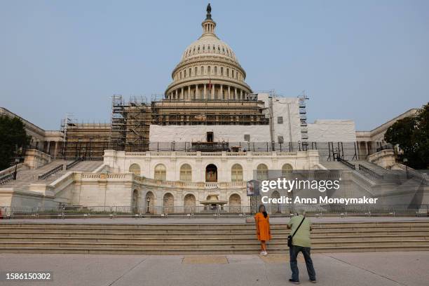 Tourists take photos near the U.S. Capitol Building on August 01, 2023 in Washington, DC. Special Counsel Jack Smith announced that former U.S....