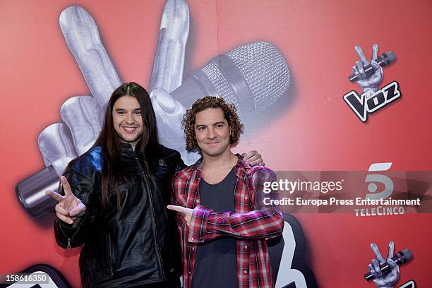 Spanish singer and coach David Bisbal and winner Rafa Carpena of 'La Voz' Tv programme attend a press conference on December 20, 2012 in Madrid,...