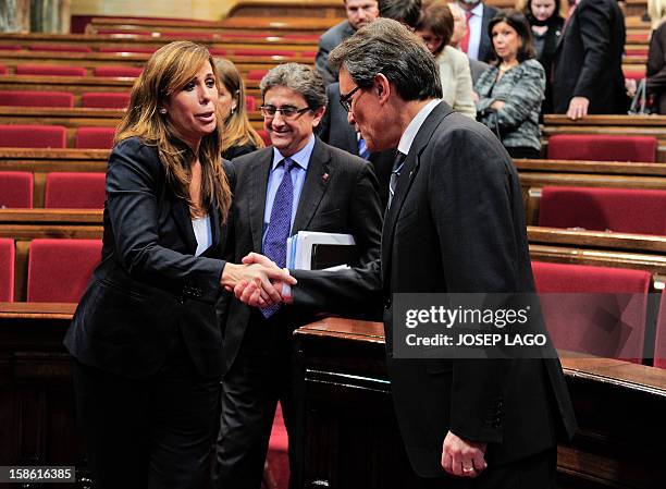 Newly elected President of the Catalonian regional government Artur Mas is congratulated by Popular Party leader of the Catalonia region Alicia...