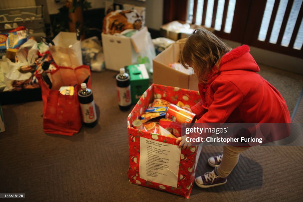 Volunteers Prepare Donated Food To Give Out At The Central Liverpool Foodbank Over The Christmas Period