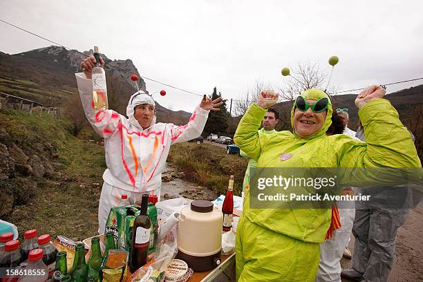 People dressed as aliens after the time passed 11.11 am, the time the Mayan Apocalypse was supposed to occur in Bugarach village on December 21, 2012...