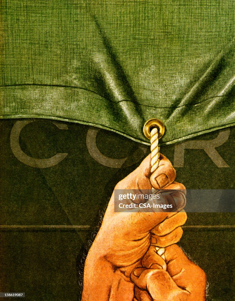 Hands Pulling Tarp Rope