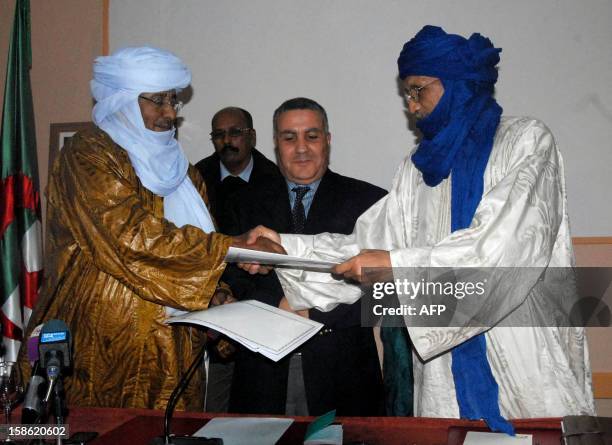 Members of Ansar Dine and Tuareg National Movement for the Liberation of Azawad are seen during a meeting in Algiers on December 21, 2012. Ansar Dine...