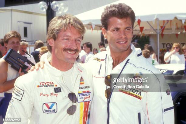 Actor Perry King and Actor Lorenzo Lamas attend the 11th Annual Toyota Grand Prix Pro/Celebrity Race on April 4, 1987 at the Toyate Grand Prix of...