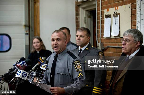 Pennsylvania State Police spokesman Lt Colonel George Bivens describes the scene of a shooting in Blair County on December 21, 2012 in Geeseytown,...