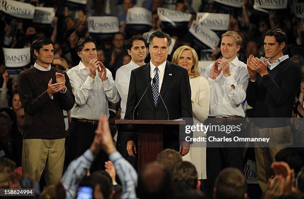 Republican presidential candidate and former Massachusetts Gov. Mitt Romney speaks during his primary night rally with members of his family, Matt,...