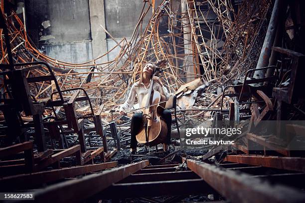 cello playing cellist musician - soloist stock pictures, royalty-free photos & images