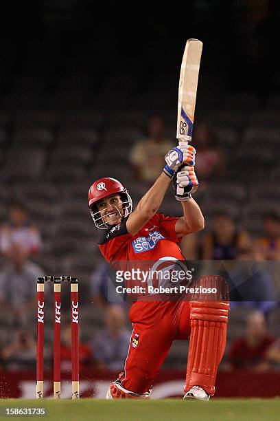 William Sheridan of the Renegades plays a shot during the Big Bash League match between the Melbourne Renegades and the Brisbane Heat at Etihad...