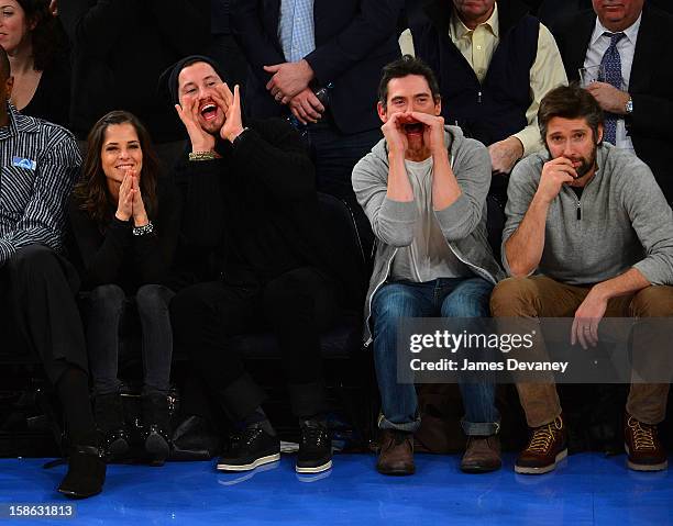 Kelly Monaco, Valentin Chmerkovskiy, Billy Crudup and Bart Freundlich attend the Chicago Bulls vs New York Knicks game at Madison Square Garden on...