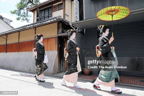 Geiko and Maiko are seen after greeting to their dance and tea masters on August 1, 2023 in Kyoto, Japan. Hassaku, August first in old Japanese lunar...