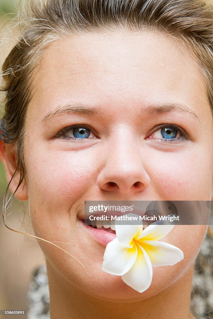 A girl with a  flower in her hair