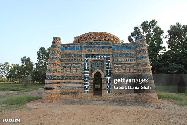 squared blue and red tiled symmetrical structure - dera ismail khan stock pictures, royalty-free photos & images