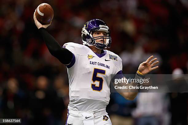 Shane Carden of the East Carolina Pirates looks to throw a pass against the Louisiana-Lafayette Ragin Cajuns during the R+L Carriers New Orleans Bowl...