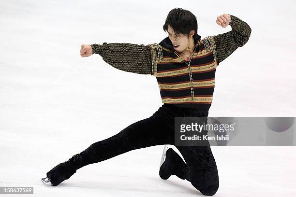 Takahito Mura competes in the Men's Free Program during day two of the 81st Japan Figure Skating Championships at Makomanai Sekisui Heim Ice Arena on...