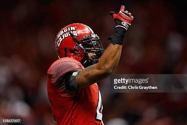 Javone Lawson of the Louisiana-Lafayette Ragin Cajuns reacts after a first down against the East Carolina Pirates during the R+L Carriers New Orleans...