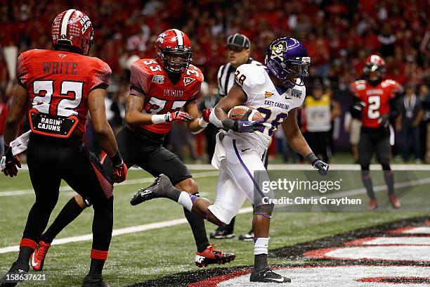 Reggie Bullock of the East Carolina Pirates scores a touchdown against the Louisiana-Lafayette Ragin Cajuns during the R+L Carriers New Orleans Bow...