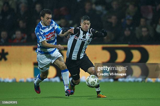 Darryl Lachman of PEC Zwolle, Everton Ramos da Silva of Heracles Almelo during the Dutch Eredivise match between Heracles Almelo and PEC Zwolle at...