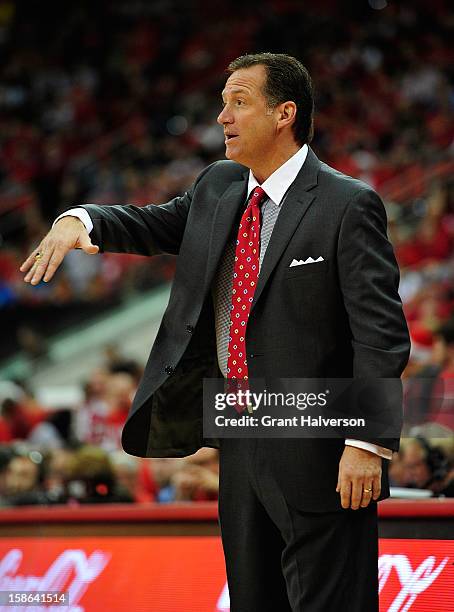 Mark Gottfried of the North Carolina State Wolfpack directs his team against the Stanford Cardinal during play at PNC Arena on December 18, 2012 in...