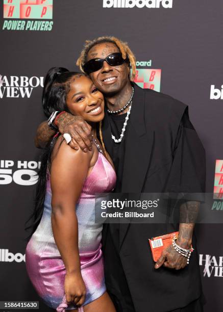 Reginae Carter and Lil Wayne at Billboard R&B Hip-Hop Live held at The Novo on August 8, 2023 in Los Angeles, California.