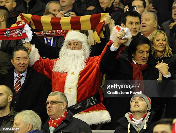 Liverpool fan dressed as father Christmas today during the Barclays Premier League match between liverpool and Fulham at Anfield on December 22, 2012...