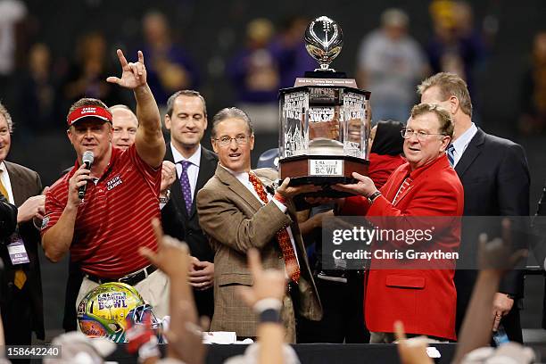 Head coach Mark Hudspeth of the Louisiana-Lafayette Ragin Cajuns celebrates after defeating the East Carolina Pirates 43-34 during the R+L Carriers...