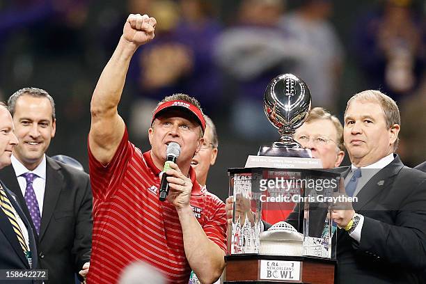 Head coach Mark Hudspeth of the Louisiana-Lafayette Ragin Cajuns celebrates after defeating the East Carolina Pirates 43-34 during the R+L Carriers...