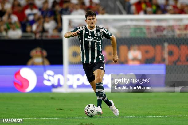Harry Maguire of Manchester United controls the ball in the second half against Real Madrid during the 2023 Soccer Champions Tour match at NRG...