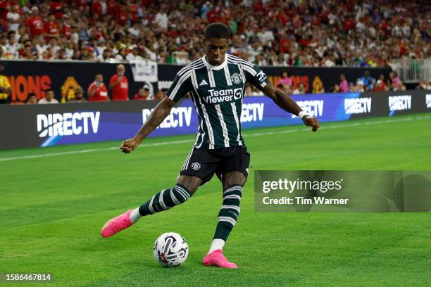 Marcus Rashford of Manchester United passes the ball in the second half against Real Madrid during the 2023 Soccer Champions Tour match at NRG...