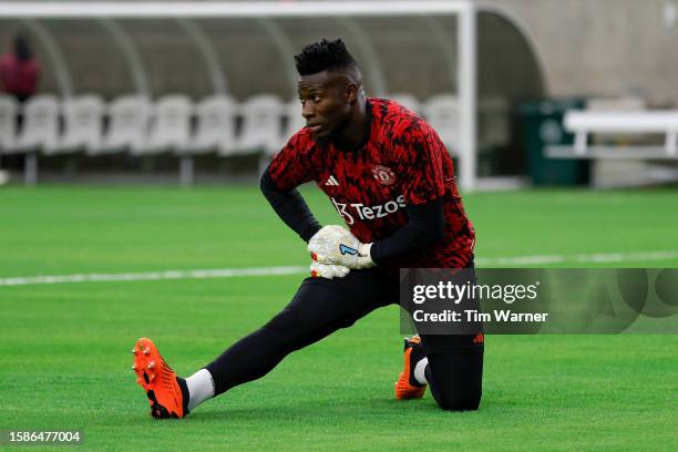 Andre Onana of Manchester United warms up before the 2023 Soccer Champions Tour match against Real Madrid at NRG Stadium on July 26, 2023 in Houston,...