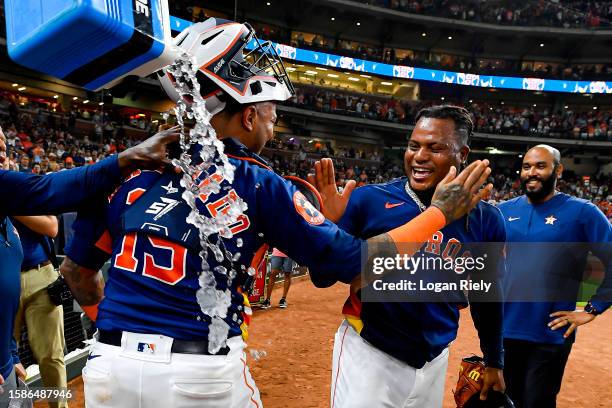 Framber Valdez celebrates with Martin Maldonado of the Houston Astros after pitching a no-hitter against the Cleveland Guardians at Minute Maid Park...