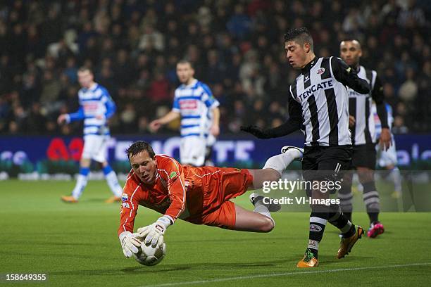 Goalkeeper Diederik Boer of PEC Zwolle, Everton Ramos da Silva of Heracles Almelo during the Dutch Eredivise match between Heracles Almelo and PEC...