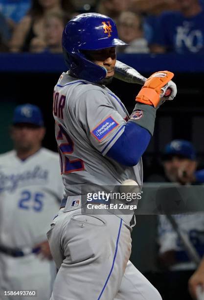 Francisco Lindor of the New York Mets is hit by a pitch throws by Dylan Coleman of the Kansas City Royals in the eighth inning at Kauffman Stadium on...