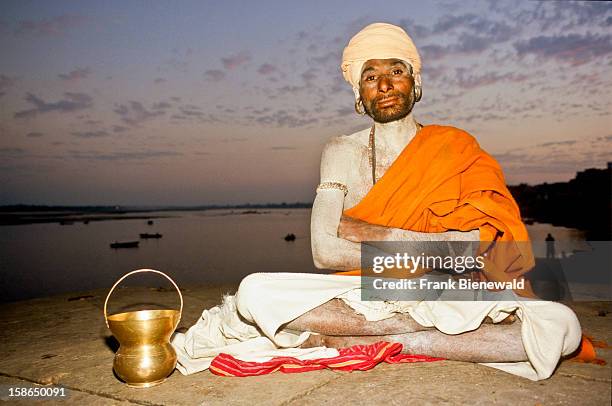 Shiva-sadhu sitting at the ghats of Varanasi.