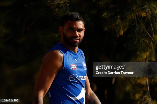 Tarryn Thomas of the Kangaroos runs out before a North Melbourne Kangaroos AFL training session at Arden Street Ground on August 02, 2023 in...